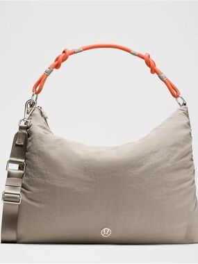 NWOT- lululemon Beige Shoulder Bag with Orange Handle